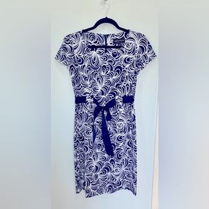 Very cute retro navy blue and white dress.